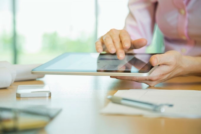 Woman holding a tablet